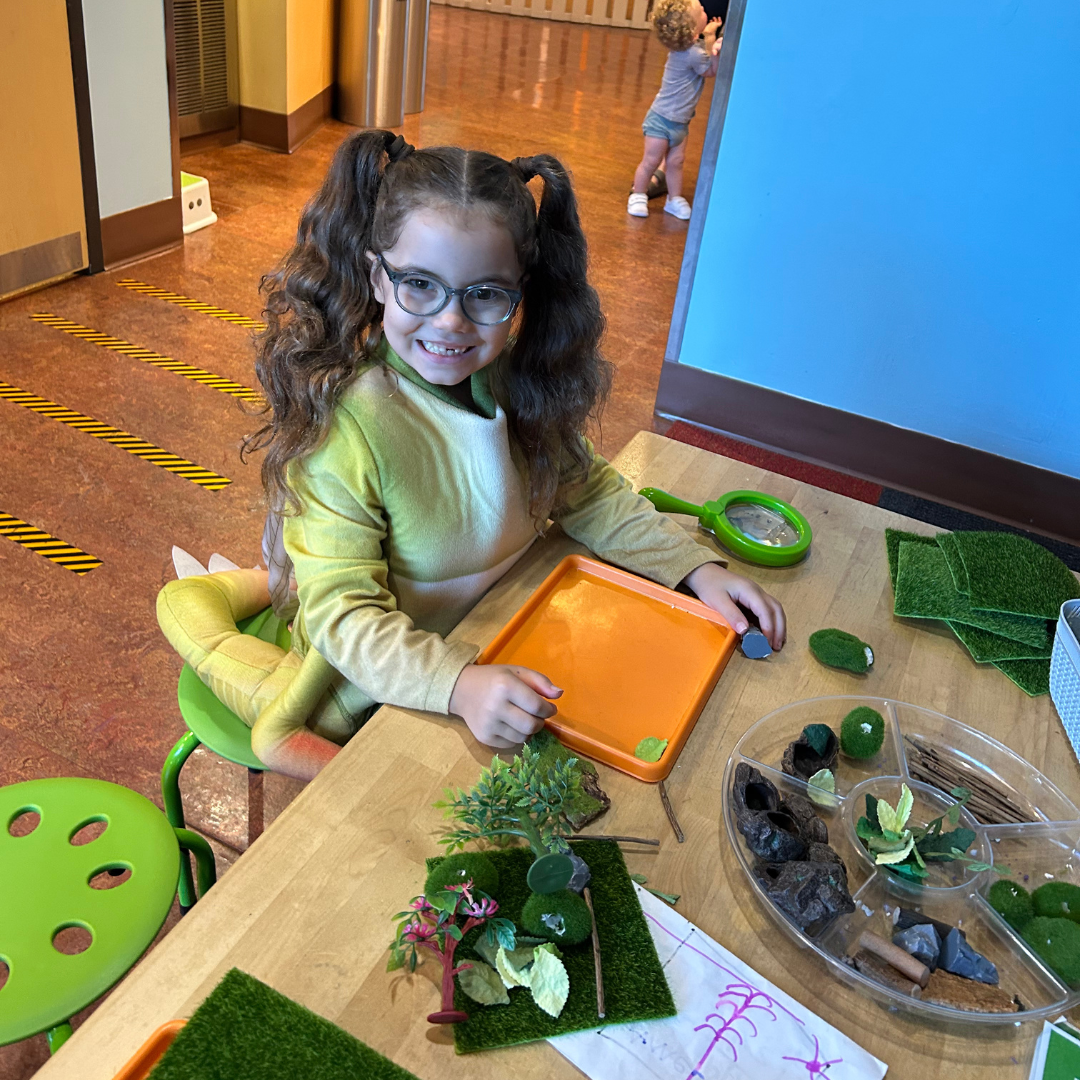 Girl in an exhibit at CMON!